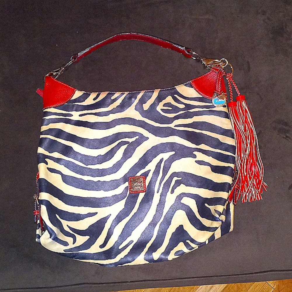DOONEY & BOURKE ALL WEATHER LEATHER LARGE ZEBRA PRINT WITH Red leather details